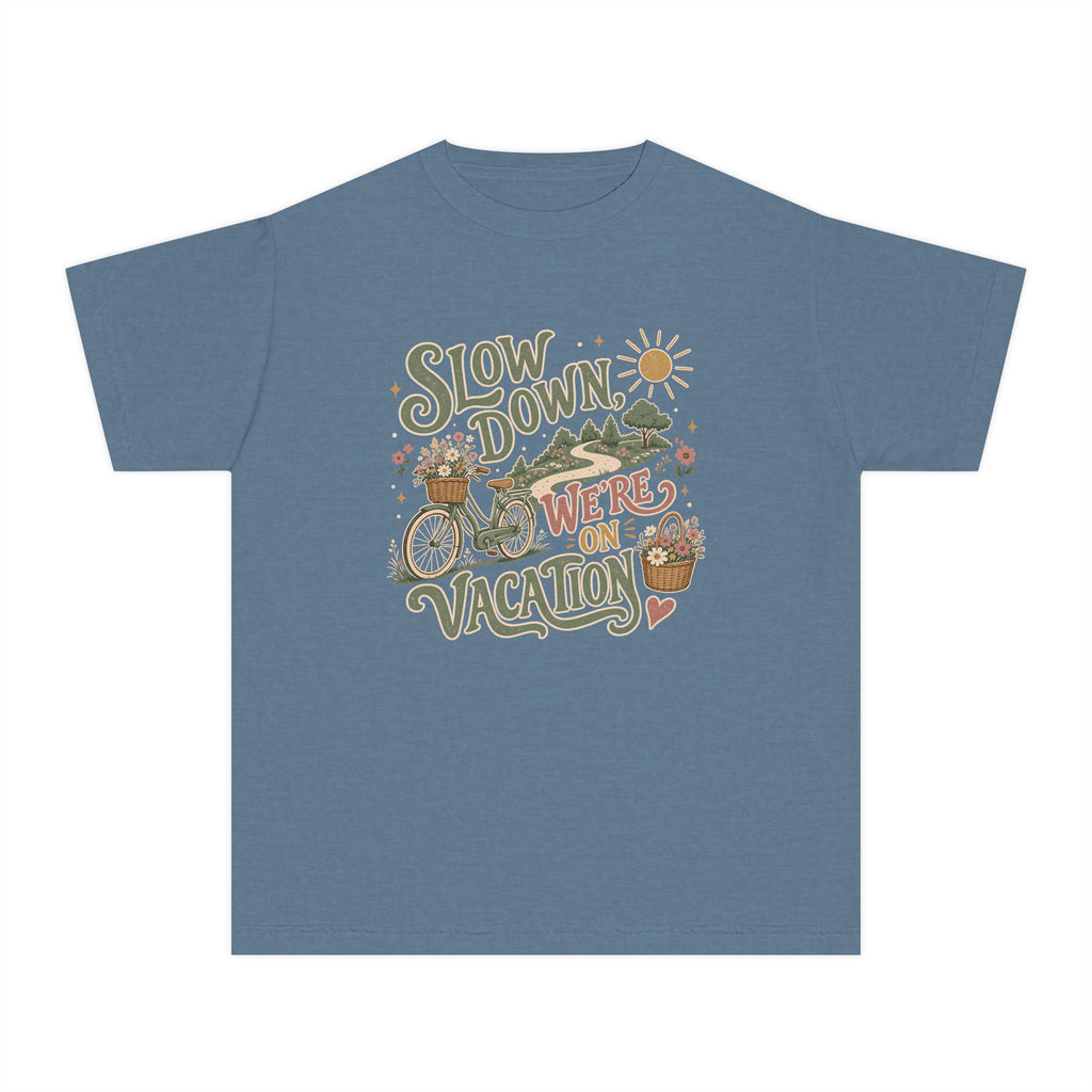 Slow Down We're on Vacation Youth Tee – Kids' Comfort Colors Travel Shirt in Blue Jean – flat lay