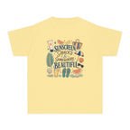 Sunscreen Snacks and Somewhere Beautiful Youth Tee – Kids' Comfort Colors Beach Vacation Shirt in Butter – flat lay