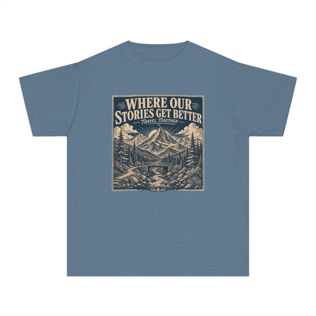 Where Our Stories Get Better Youth Tee – Kids' Comfort Colors Mountain Adventure Shirt in Blue Jean – flat lay
