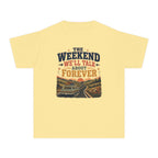 The Weekend We'll Talk About Forever Youth Tee – Kids' Comfort Colors Road Trip Shirt in Butter – flat lay