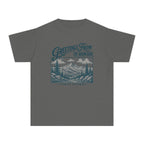Greetings from the Mountains Family Getaway Youth Tee – Kids' Comfort Colors Cabin Weekend Shirt in Pepper – flat lay