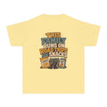 Road Trips and Snacks Youth Tee – Kids' Comfort Colors Family Travel Shirt in Butter – flat lay