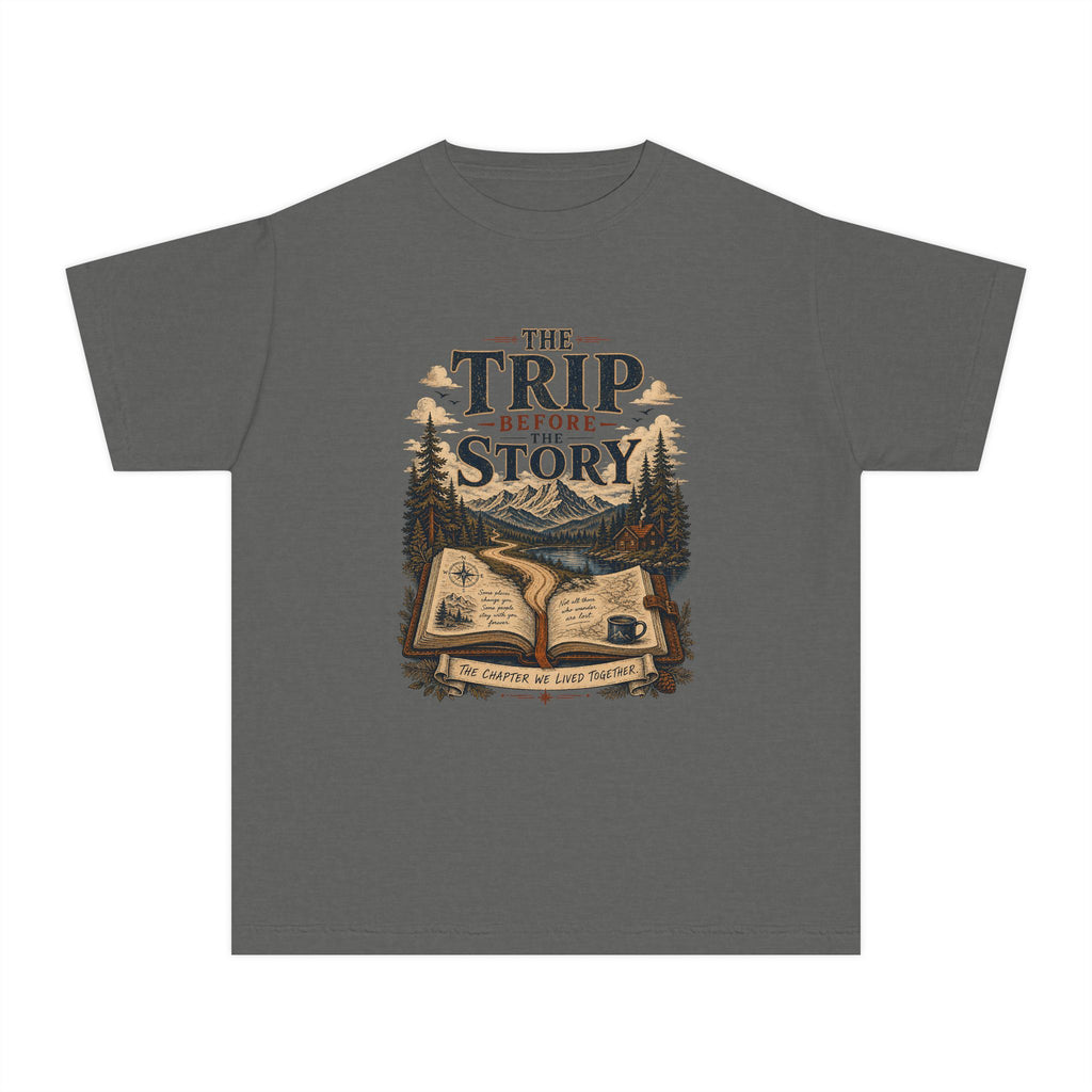 The Trip Before the Story Youth Tee – Kids' Comfort Colors Travel Shirt in Pepper – flat lay