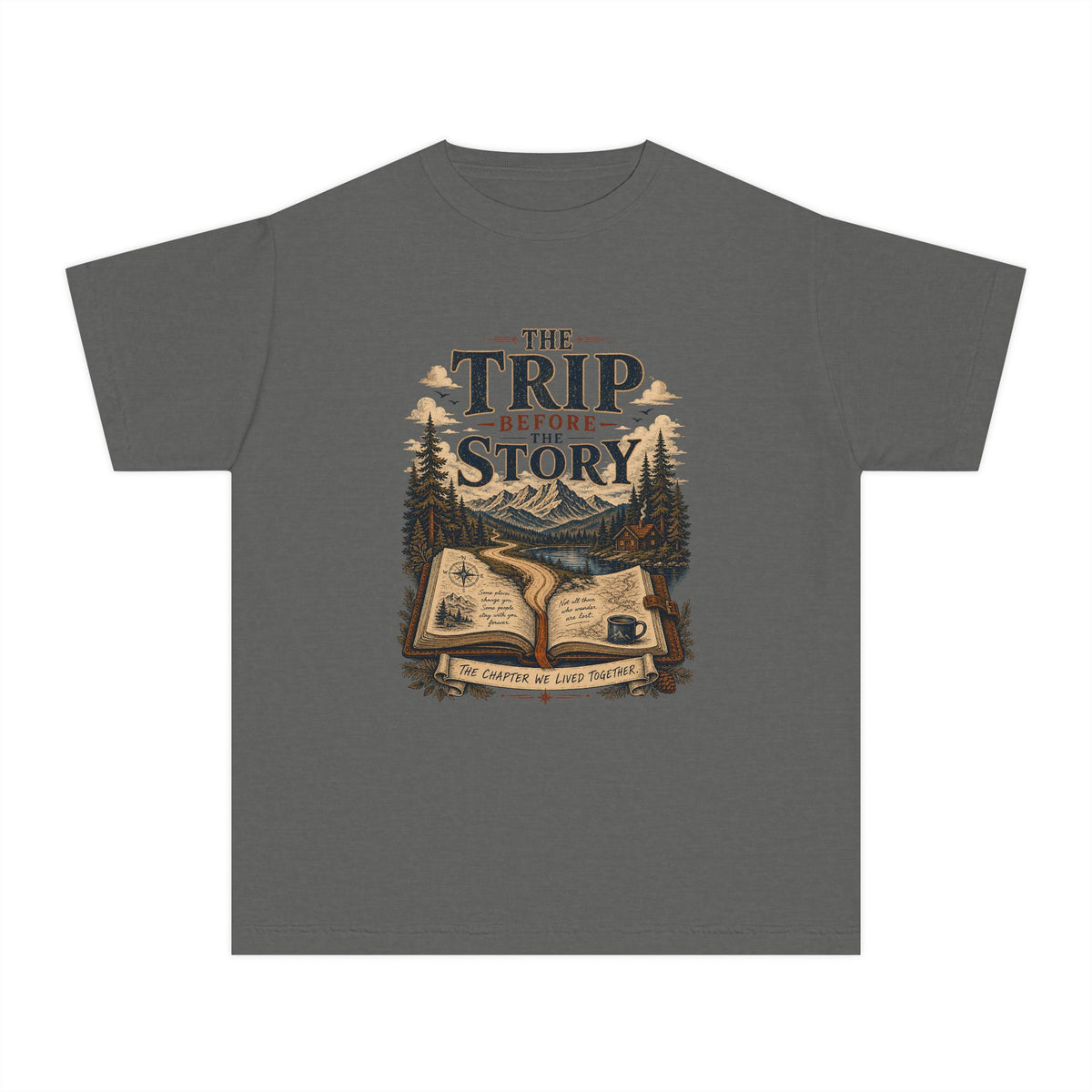 The Trip Before the Story Youth Tee – Kids' Comfort Colors Travel Shirt in Pepper – flat lay