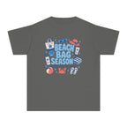Beach Bag Season Youth Tee – Kids' Comfort Colors Beach Vacation Shirt in Pepper – flat lay