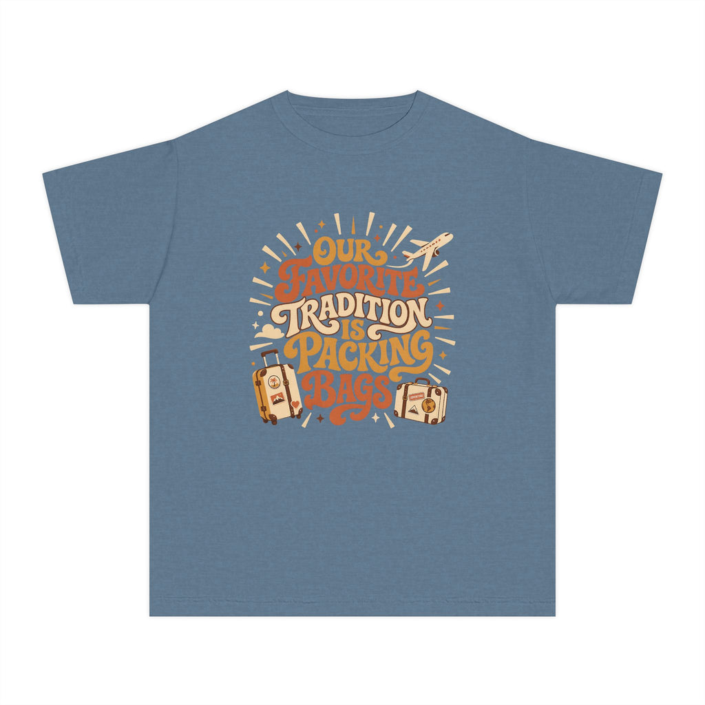 Our Favorite Tradition Is Packing Bags Youth Tee – Kids' Comfort Colors Family Travel Shirt in Blue Jean – flat lay