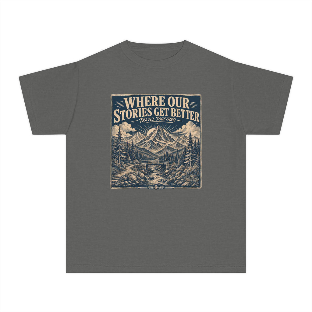 Where Our Stories Get Better Youth Tee – Kids' Comfort Colors Mountain Adventure Shirt in Pepper – flat lay
