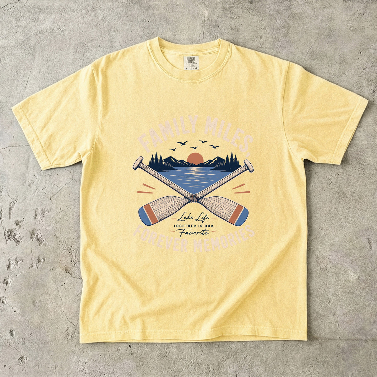 Family Miles Forever Memories Lake Vacation Shirt in Butter – flat lay