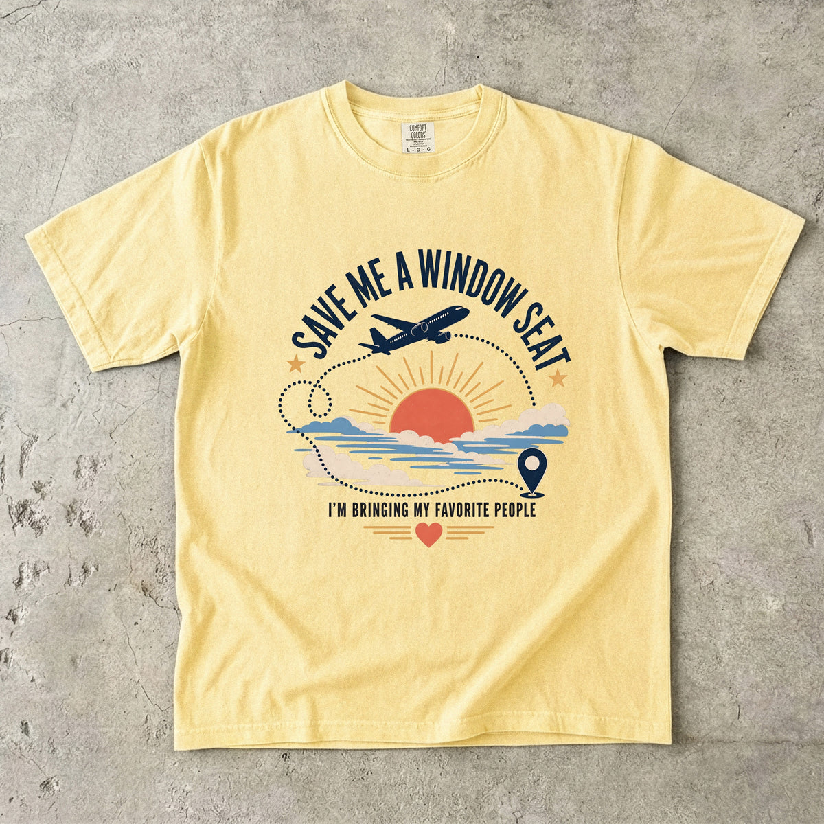 Save Me a Window Seat Family Travel Shirt in Butter – flat lay