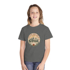 Adventure Looks Good On Us Youth Tee – Kids' Comfort Colors Mountain Travel Shirt – flat lay