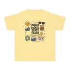 Snacks Packed Seats Filled Youth Tee – Kids' Comfort Colors Road Trip Shirt in Butter – flat lay