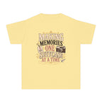 Making Memories One Suitcase at a Time Youth Tee – Kids' Comfort Colors Family Travel Shirt in Butter – flat lay