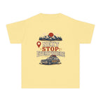 Next Stop Everywhere Youth Tee – Kids' Comfort Colors Road Trip Shirt in Butter – flat lay