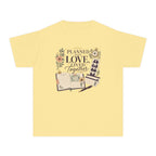 Planned With Love Lived Together Youth Tee – Kids' Comfort Colors Family Travel Shirt in Butter – flat lay