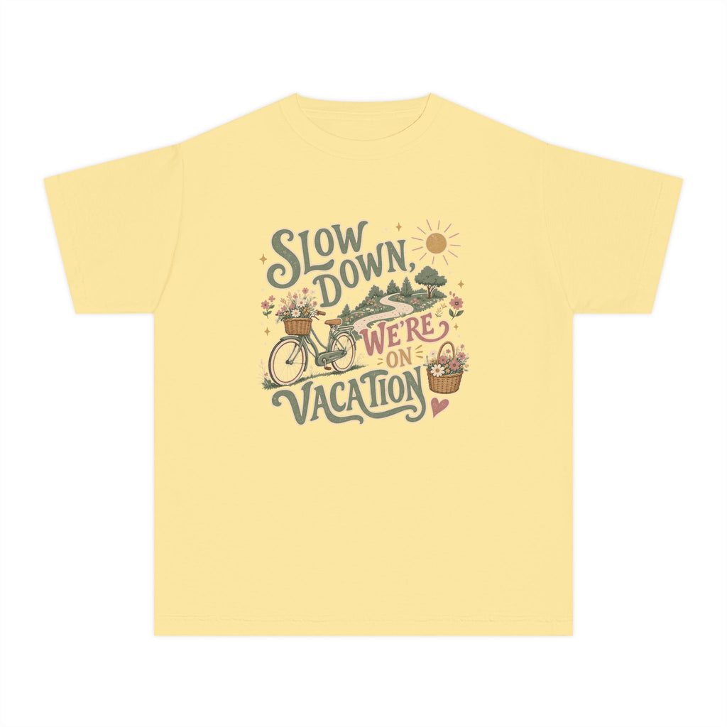 Slow Down We're on Vacation Youth Tee – Kids' Comfort Colors Travel Shirt in Butter – flat lay