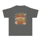 Our Favorite Tradition Is Packing Bags Youth Tee – Kids' Comfort Colors Family Travel Shirt in Pepper – flat lay