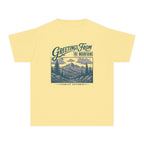 Greetings from the Mountains Family Getaway Youth Tee – Kids' Comfort Colors Cabin Weekend Shirt in Butter – flat lay