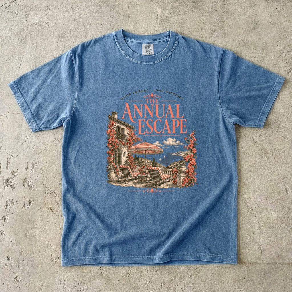 The Annual Escape Girls Trip Shirt in Blue Jean – flat lay