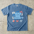 Beach Bag Season Beach Vacation Shirt in Blue Jean – flat lay