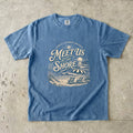 Meet Us at the Shore Beach Vacation Shirt in Blue Jean – flat lay