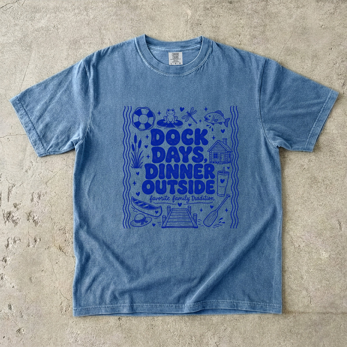 Dock Days Dinner Outside Lake Vacation Shirt in Blue Jean – flat lay