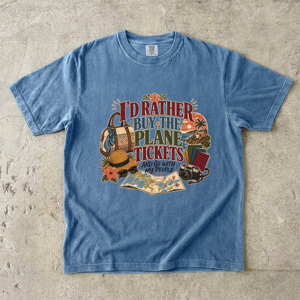 I'd Rather Buy the Plane Tickets Travel Mom Shirt in Blue Jean – flat lay