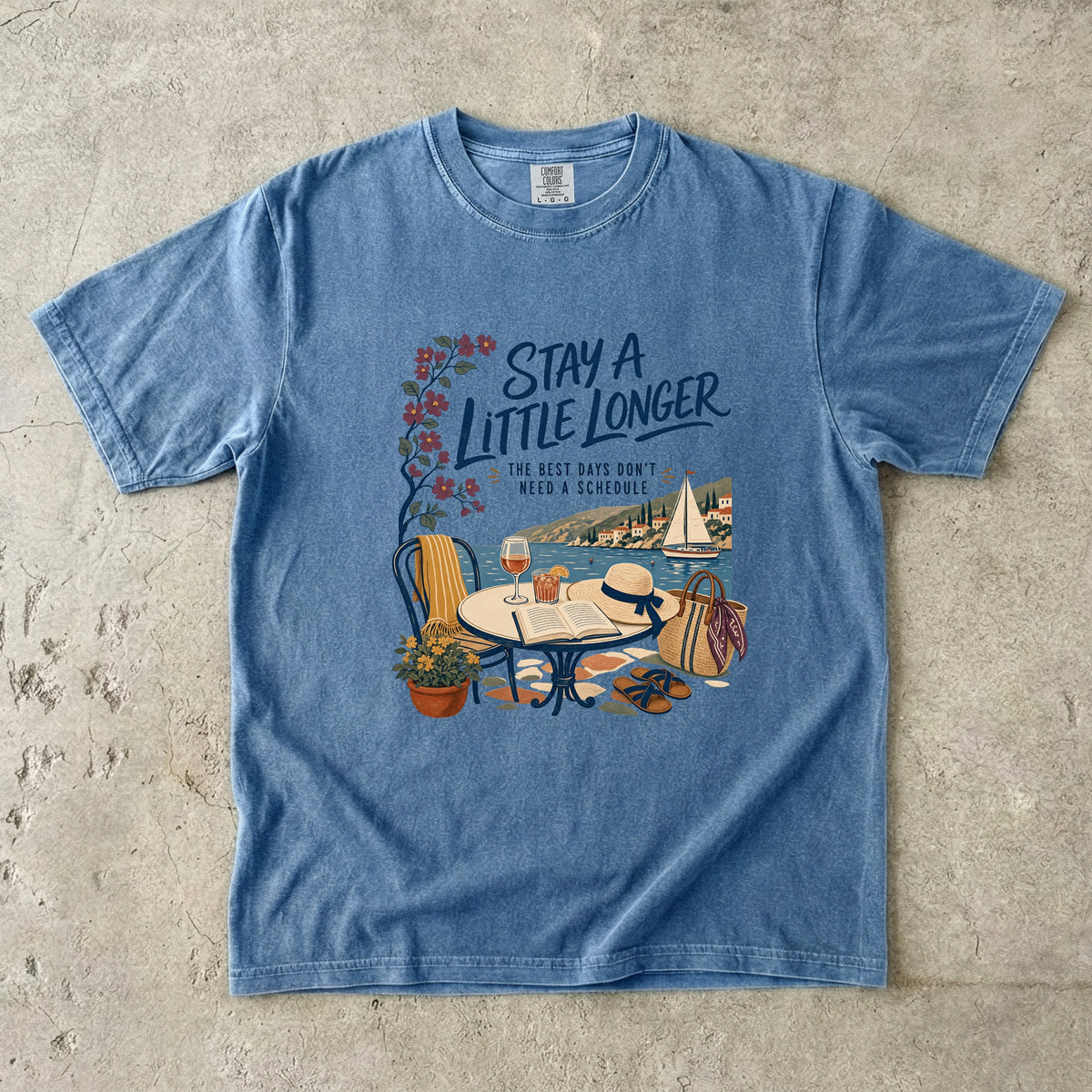 Stay a Little Longer Girls Trip Shirt in Blue Jean – flat lay
