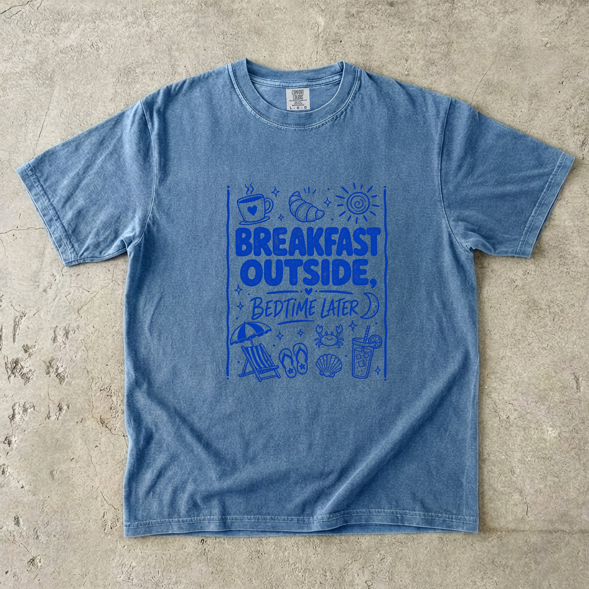 Breakfast Outside Bedtime Later Beach Vacation Shirt in Blue Jean – flat lay