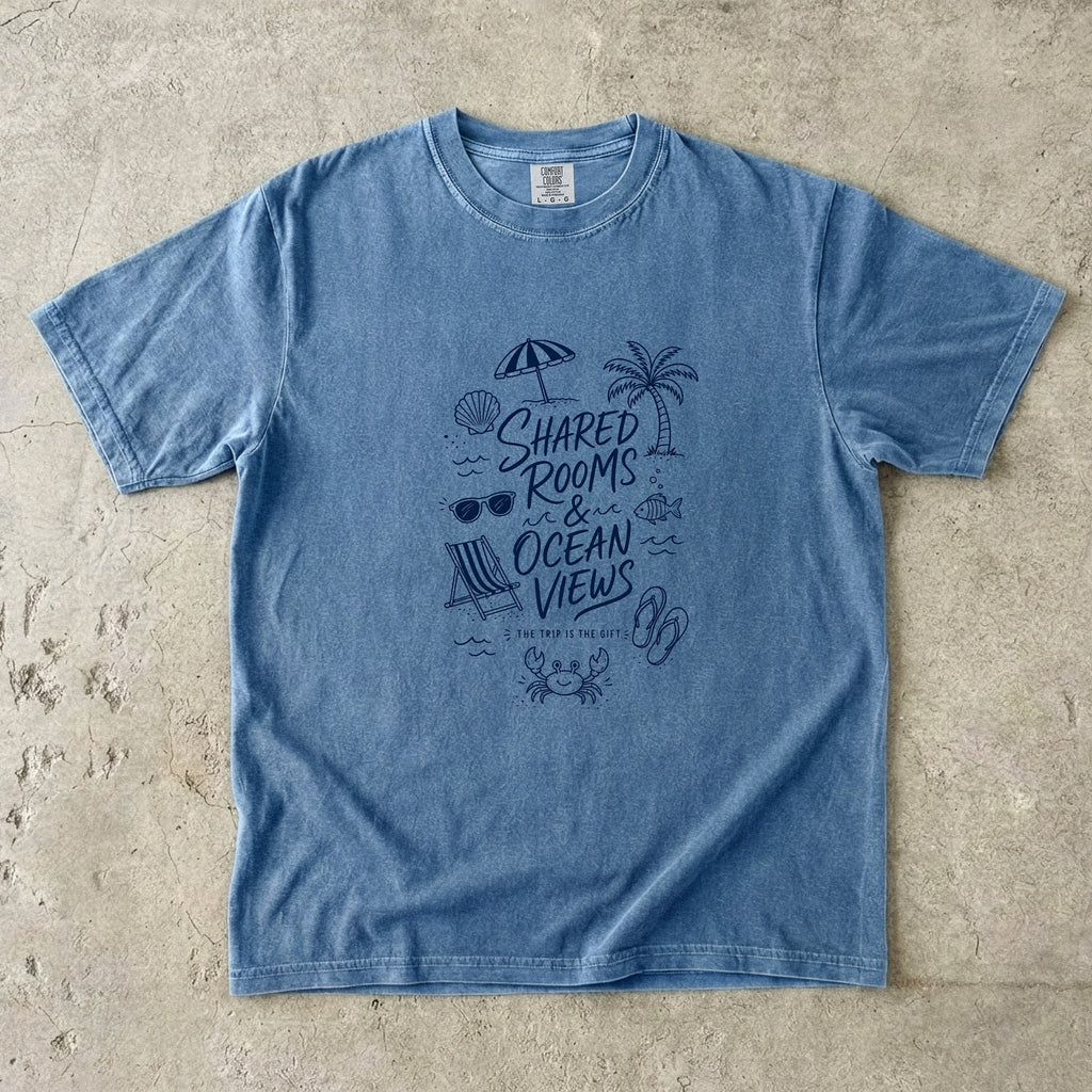 Shared Rooms and Ocean Views Girls Trip Shirt in Blue Jean – flat lay