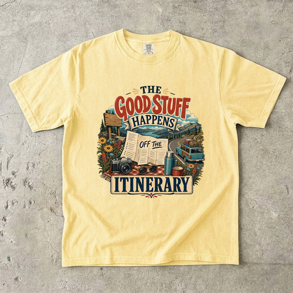 The Good Stuff Happens Off the Itinerary Travel Mom Shirt in Butter – flat lay