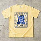 Lake Days Late Bedtimes Lake Vacation Shirt in Butter – flat lay