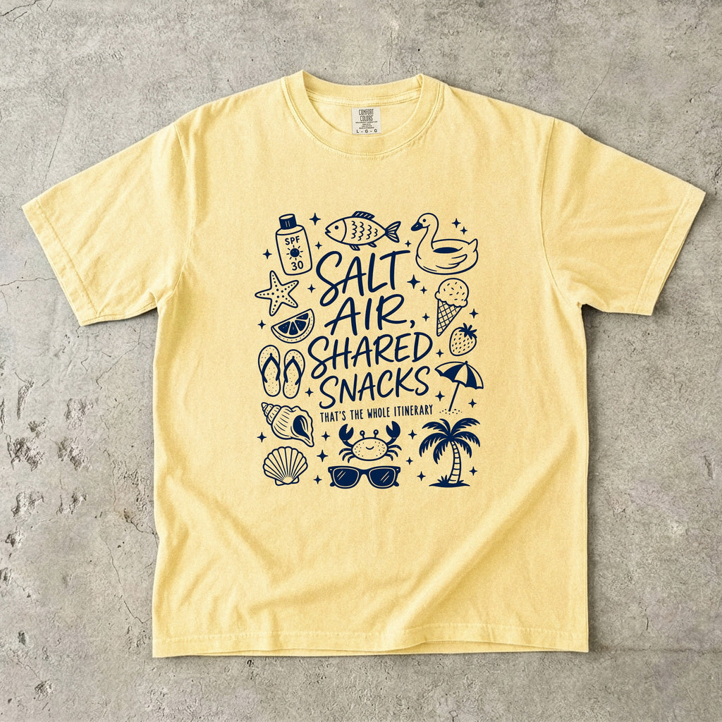Salt Air Shared Snacks Beach Vacation Shirt in Butter – flat lay