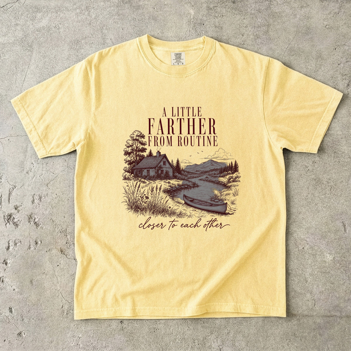 A Little Farther from Routine Family Getaway Shirt in Butter – flat lay