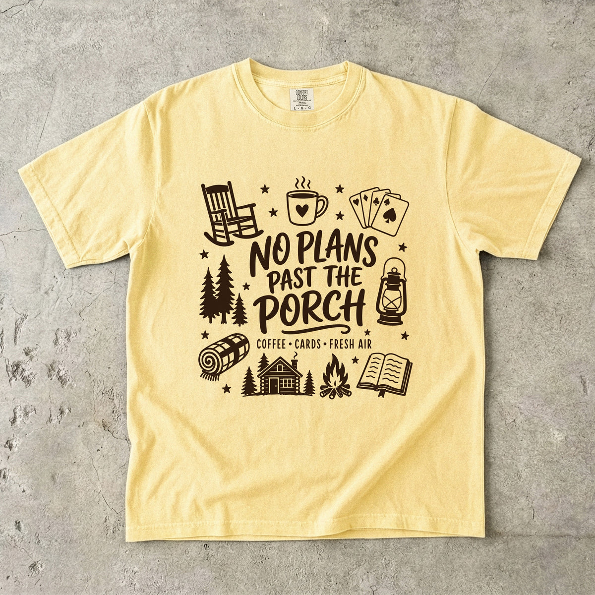 No Plans Past the Porch Cabin Weekend Shirt in Butter – flat lay