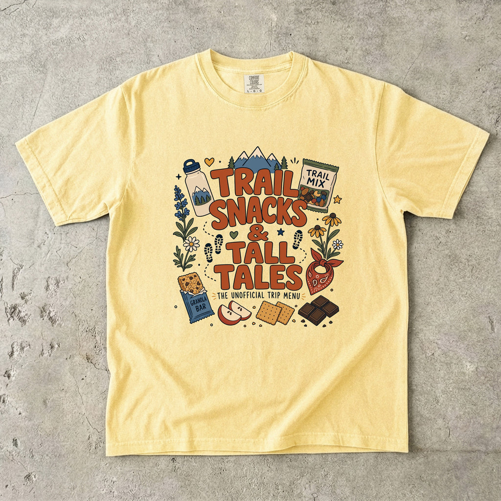 Trail Snacks and Tall Tales Mountain Adventure Shirt in Butter – flat lay