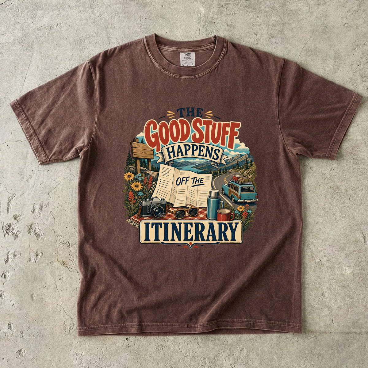 The Good Stuff Happens Off the Itinerary Travel Mom Shirt in Espresso – flat lay