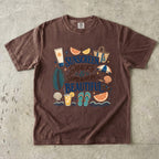 Sunscreen Snacks and Somewhere Beautiful Beach Vacation Shirt in Espresso – flat lay