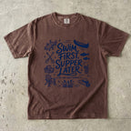 Swim First Supper Later Lake Vacation Shirt in Espresso – flat lay