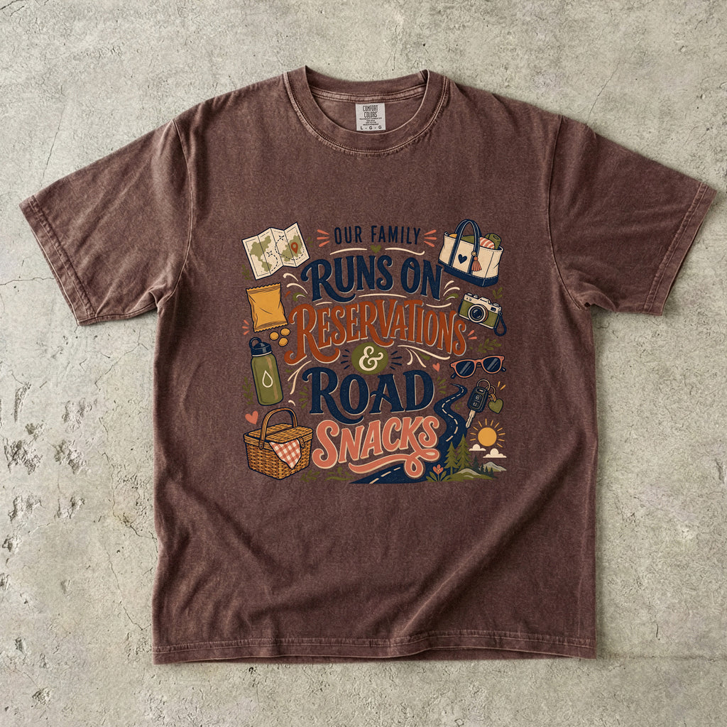 Our Family Runs on Reservations and Road Snacks Road Trip Shirt in Espresso – flat lay