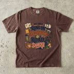 Our Family Runs on Reservations and Road Snacks Road Trip Shirt in Espresso – flat lay