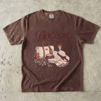Pack Light Stay Longer Girls Trip Shirt in Espresso – flat lay