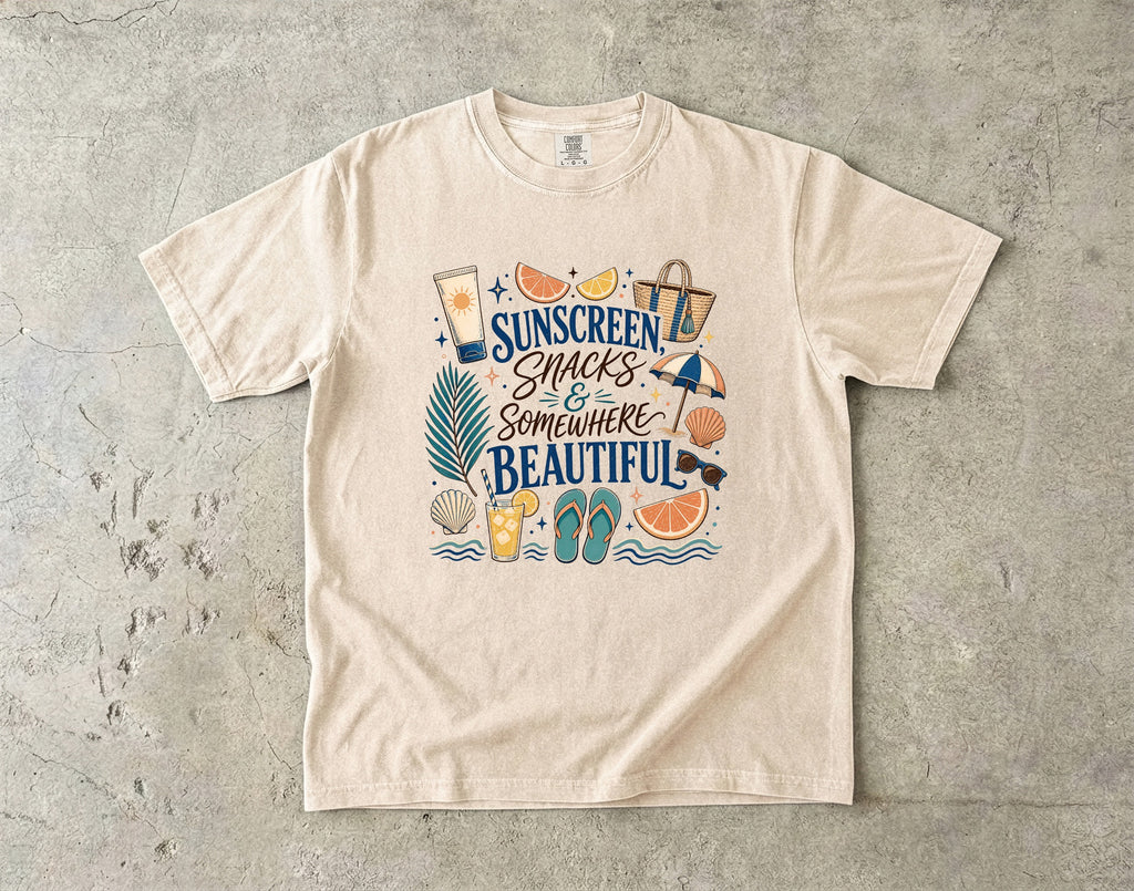 Sunscreen Snacks and Somewhere Beautiful Beach Vacation Shirt in Ivory – flat lay