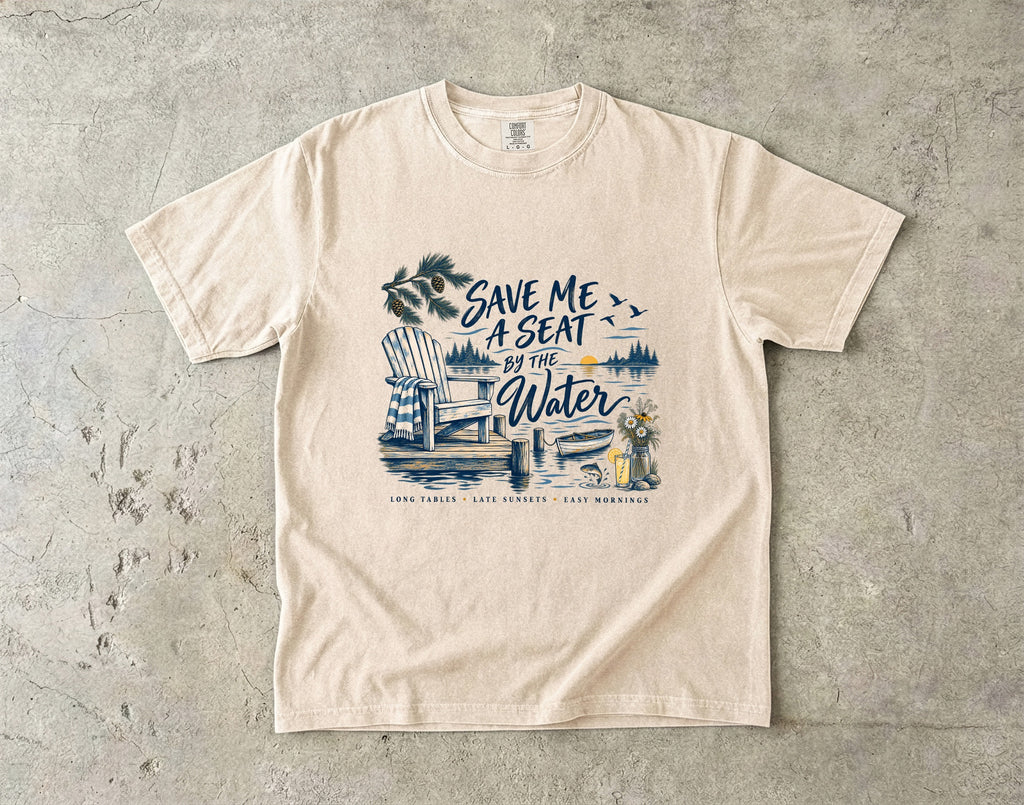 Save Me a Seat by the Water Lake Vacation Shirt in Ivory – flat lay