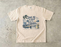 Save Me a Seat by the Water Lake Vacation Shirt in Ivory – flat lay