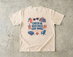 Check-In Kick Back Stay Awhile Family Getaway Shirt in Ivory – flat lay