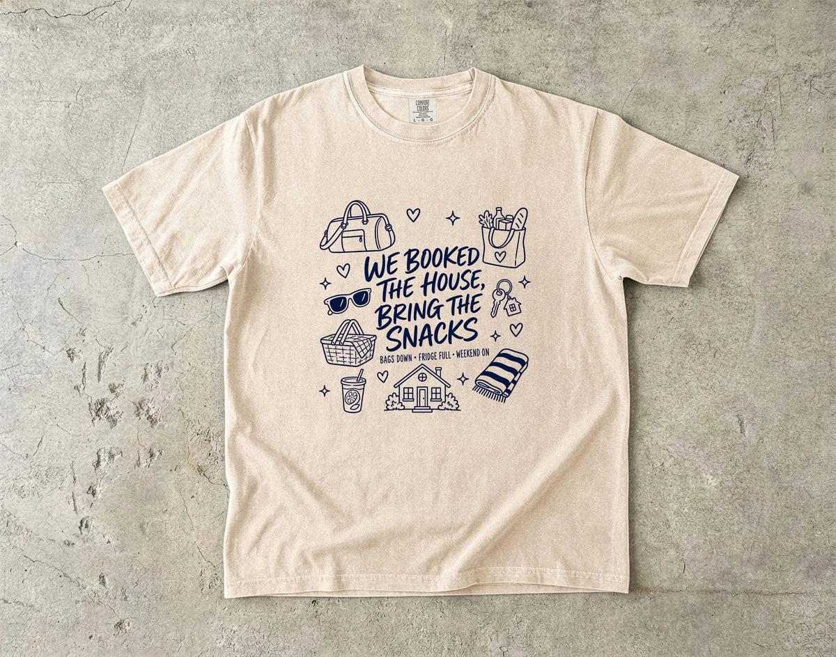 We Booked the House Bring the Snacks Family Getaway Shirt in Ivory – flat lay