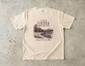 A Little Farther from Routine Family Getaway Shirt in Ivory – flat lay