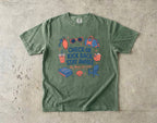Check-In Kick Back Stay Awhile Family Getaway Shirt in Moss – flat lay