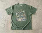 Meet Us at the Shore Beach Vacation Shirt in Moss – flat lay