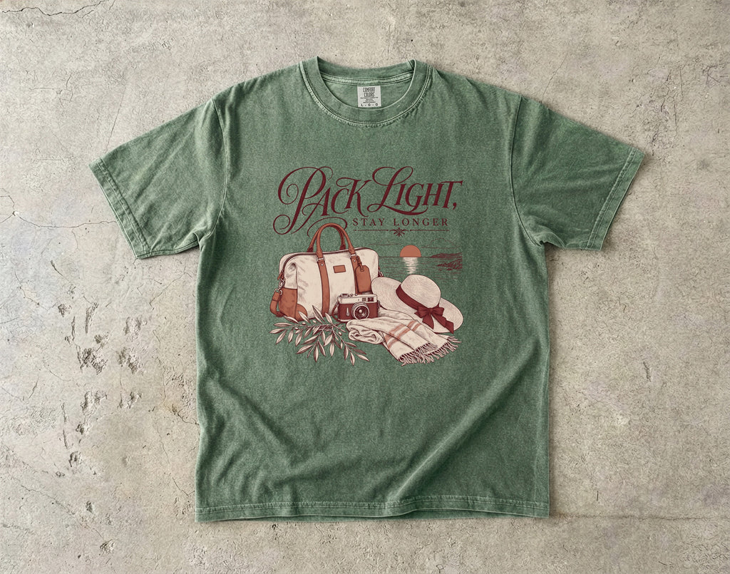 Pack Light Stay Longer Girls Trip Shirt in Moss – flat lay